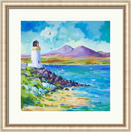 The Paps of Jura by Ann Vastano framed wall art print showing a white lighthouse, blue sea, sandy shore and Jura mountains